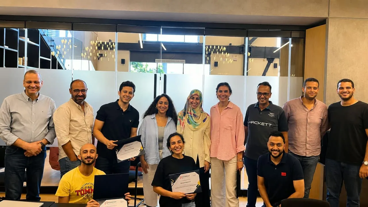 Roche Egypt key-account team holding their Strategic Account Excellence certificates